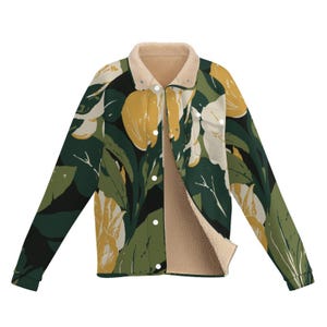 May include: A long-sleeve jacket featuring a dark green background with a repeating pattern of yellow and white floral shapes. The jacket has a beige sherpa-style fleece lining, a fold-over collar, and a front closure with white snap buttons.