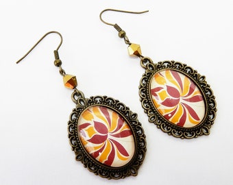 Boucles d'oreilles pendantes Lotus rouge orange et or