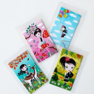 May include: Four colorful cards featuring illustrations of girls in different settings. The first card shows a girl with black hair sitting on a red mushroom in a forest. The second card shows a girl with black hair holding balloons in a blue sky. The third card shows a girl with black hair riding a deer in a forest. The fourth card shows a girl with black hair holding a black cat in a forest.
