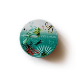 Drawing printed on small round box Dream box