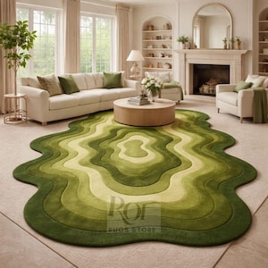 Topographic layered green area rug shown in a spacious classical interior. Wavy organic shape with multiple contour layers in deep and light green tones, resembling terrain elevation. Plush tufted texture, modern artistic floor decor for living rooms or luxury spaces.