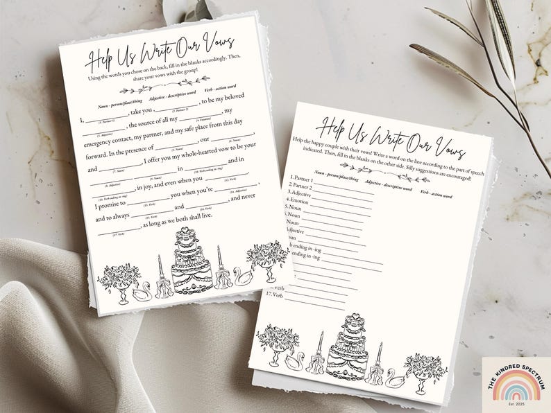 Puede incluir: Dos tarjetas blancas con el texto "Help Us Write Our Vows" en escritura negra. Las tarjetas tienen indicaciones para rellenar los votos matrimoniales, con ilustraciones decorativas de una tarta, flores y cisnes. El logotipo de Kindred Spectrum es visible.