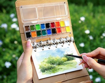 Travel Watercolor Kit, A7 Leather Ring Binder Sketchbook, 18 Vibrant Colors Palette, Portable Art Journal Set with Paper and Brushes Boxed