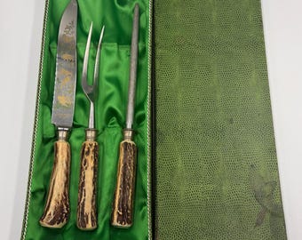 Conjunto de talheres para trinchar vintage Anton Wingen Jr. Solingen, Alemanha, com cabos de chifre de veado e caixa.
