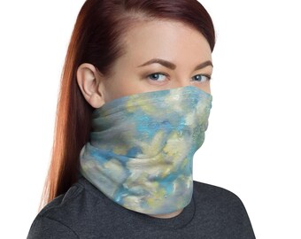 May include: A neck gaiter with a blue, yellow, and white abstract design. The face covering is made of a soft, lightweight material. The neck gaiter is worn around the neck and covers the lower face.