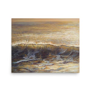 May include: An oil painting depicts a wave cresting in the ocean. The artwork features shades of gold, brown, and blue, with the wave's foamy crest illuminated by sunlight. The artist's signature is visible in the lower left corner.