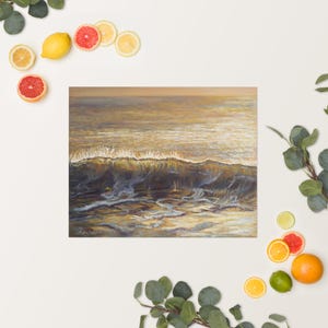 May include: An ocean wave painting in shades of gold, brown, and white. The artwork depicts a cresting wave with foamy white water. The painting is on a white background, with citrus fruits and greenery around the edges.