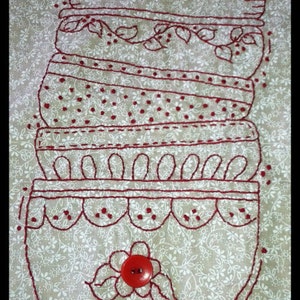 May include: A stack of five red embroidered bowls with a red button flower on a white background with a small floral pattern. The text "Busyascanbe.com" is at the bottom of the image.