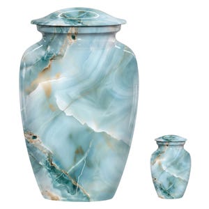 May include: A large and a small cremation urn featuring a polished finish with a marbled pattern in shades of light blue, teal, and white, accented by thin brown veins. Both urns have a rounded body and a matching removable lid on top.