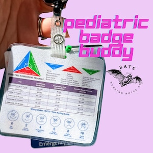 May include: A white plastic pediatric badge buddy featuring a Pediatric Assessment Triangle chart with color-coded sections, a heart rate and blood pressure table, and the Wong-Baker FACES pain rating scale. A black clip is attached to the top.