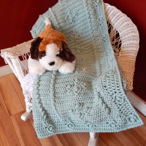 Baby Blanket Crochet Pattern: Cabled Blooms Blanket – A Textured DIY Home Decor Creation or baby blanket