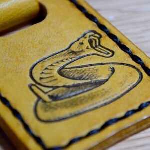 The &quot;Don&#39;t Tread on Me&quot; leather keychain.
