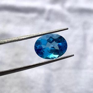 London Blue Topaz Gemstone, High-Quality Oval Faceted Loose Stone for Jewelry Crafting, Perfect Gift for Jewelry Makers 15x20 mm