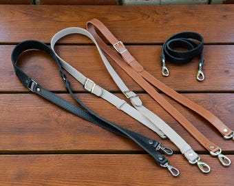 Verstelbare zwarte leren tasriem: crossbody of schouder