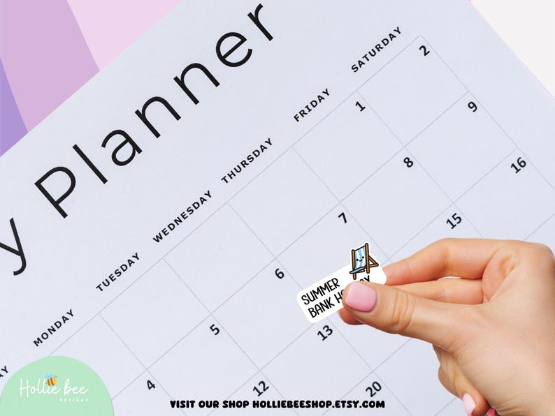 May include: A white rectangular planner sticker featuring the text SUMMER BANK HOLIDAY and a small illustration of a blue and white striped beach chair. The sticker is being placed onto a grid-style weekly planner page with black text.