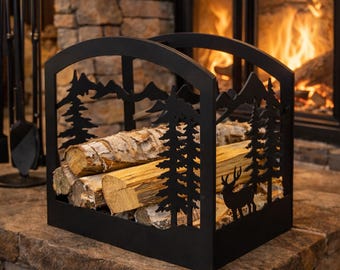Firewood Storage Rack Log Holder Metal fireplace wood holder with forest and deer motifs.