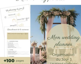 Könnte beinhalten: Ein Hochzeitsplaner mit dem Text "Mon wedding planner" in Schreibschrift. Der Planer enthält Seiten zur Planung der Zeremonie, mit einem mit Blumen geschmückten Hochzeitsbogen im Hintergrund. Der Planer hat über 100 Seiten.