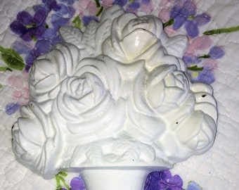 Vintage Cast Iron Door Stop with White Roses Design