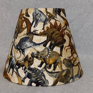 Dinosaur lamp shade. Realistic, real, dino.  Shades are 9.5&quot; x 5&quot; x 7&quot; tall.  Fabric is from FabricUtopia