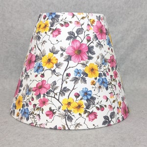 Bright flowers and branches lamp shade.  White background.  Colorful.  Plants.  Flowers. Ninthisle. Shades are 9.5&quot; x 5&quot; x 7&quot; tall