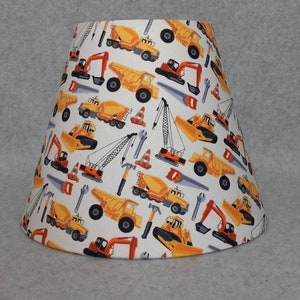 Construction lamp shade. Dump truck, dozer, crane, cement, tools.  Shades are 9.5&quot; x 5&quot; x 7&quot; tall