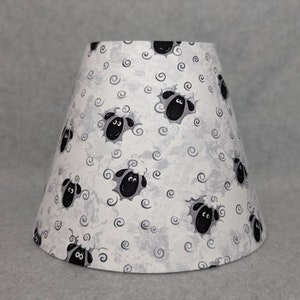 Sheep lamp shade.  Black sheep. Shades are 9.5" x 5" x 7" tall