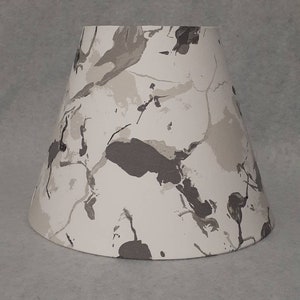 Grey / gray marble appearance lamp shade.  Marble pattern.  Shade is 9.5 wide at the bottom, 5" wide at the top and 7" tall