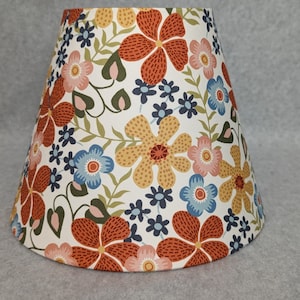 Classic Orange, pink Hippie flowers lamp shade. Blue, navy. Retro look.  Cream background.  Flower. Shades are 9.5" x 5" x 7" tall
