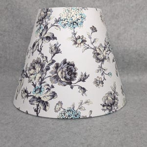 Gray, blue and cream flowers lamp shade.  White background.  Grey. Plants.  Flowers. Shades are 9.5&quot; x 5&quot; x 7&quot; tall