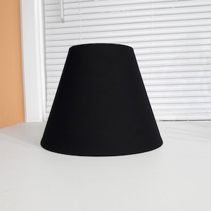 Black lamp shade.  Shade is 9.5&quot; wide at the bottom, 5&quot; wide at the top and 7&quot; tall