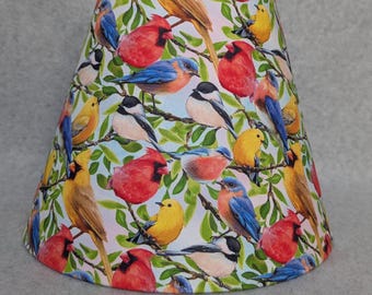 Colorful birds on branches lamp shade.   Blue Jay, Cardinal, Finch.  Chickadee.  Trees.  Flowers. Shades are 9.5" x 5" x 7" tall
