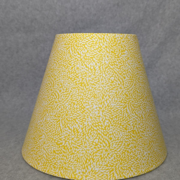 Yellow with white dots lamp shade.  Shade is 9.5 wide at the bottom, 5" wide at the top and 7" tall