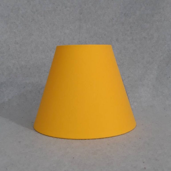 Yellow lamp shade.  Solid color.  Shade is 9.5 wide at the bottom, 5" wide at the top and 7" tall