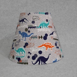 Dinosaur lamp shade.   Shades are 9.5&quot; x 5&quot; x 7&quot; tall