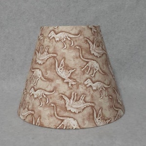 Dinosaur lamp shade.   Bones.  Shades are 9.5&quot; x 5&quot; x 7&quot; tall