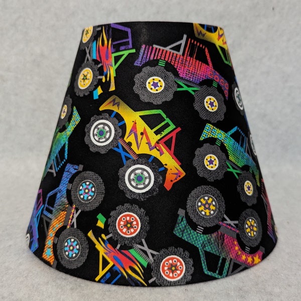 Colorful Monster Truck lamp shade.  Shades are 9.5" wide at the bottom, 5" wide at the top and 7" tall.