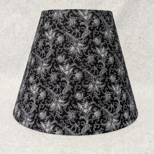 Stitch flowers and vines lamp shade.  Black and silver.  Flower. Shades are 9.5&quot; x 5&quot; x 7&quot; tall