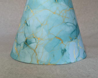 Green, teal, gold swirl lamp shade.  Geode.  Shade is 9.5 wide at the bottom, 5" wide at the top and 7" tall.