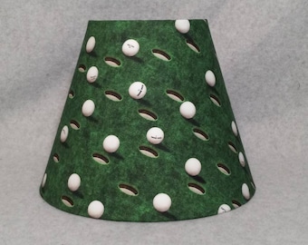 Golf ball lamp shade.  Shades are 9.5" x 5" x 7" tall