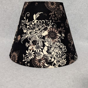 Black lamp shade with cream flowers and medallions.  Black, cream and gray.  Plants.  Flower. Shades are 9.5&quot; x 5&quot; x 7&quot; tall