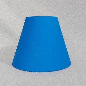 Blue lamp shade.  Solid blue.  Shade is 9.5&quot; wide at the bottom, 5&quot; wide at the top and 7&quot; tall