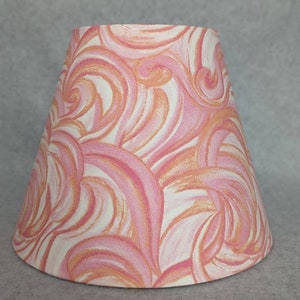 Pink and orange swirl lamp shade.  Salmon. Peach, swirl. Accent shade.  Shade is 9.5 wide at the bottom, 5&quot; wide at the top and 7&quot; tall