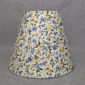 Yellow and blue flowers lamp shade.  Cream background.  Shades are 9.5&quot; x 5&quot; x 7&quot; tall
