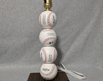 Baseball lamp. Made with real baseballs.  Can be personalized.  The Original and often imitated, never duplicated.