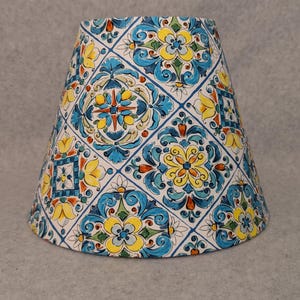 Mediterranean tile look lamp shade. Fabric. Blue,red, yellow, green.  Accent.  Shades are 9.5" x 5" x 7" tall