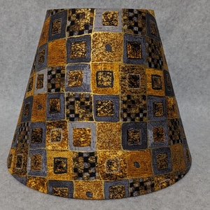 Squares with metallic gold lamp shade.  Gustav Klimt. Art.  Shade is 9.5 wide at the bottom, 5" wide at the top and 7" tall