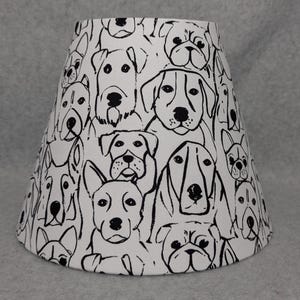 Puppy dog heads lamp shade.  Black and white.  Shades are 9.5&quot; x 5&quot; x 7&quot; tall