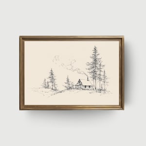May include: A framed black and white pen and ink drawing of a cabin in a forest. The cabin has a smoking chimney. Tall pine trees surround the cabin. The frame is a gold color.