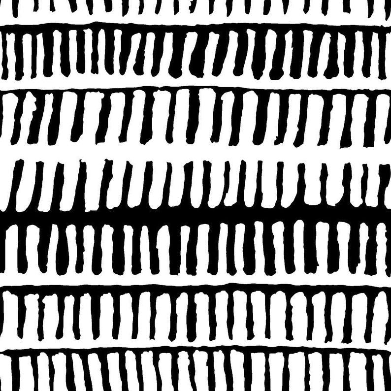 a repeating pattern of vertical lines in black and white.