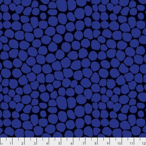 The image is a close-up of a pattern of blue circles or dots on a dark background.